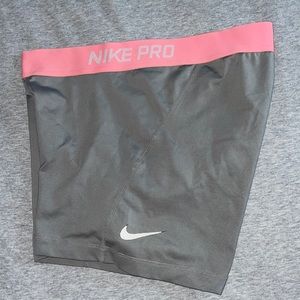 Gray and pink Nike pro shorts